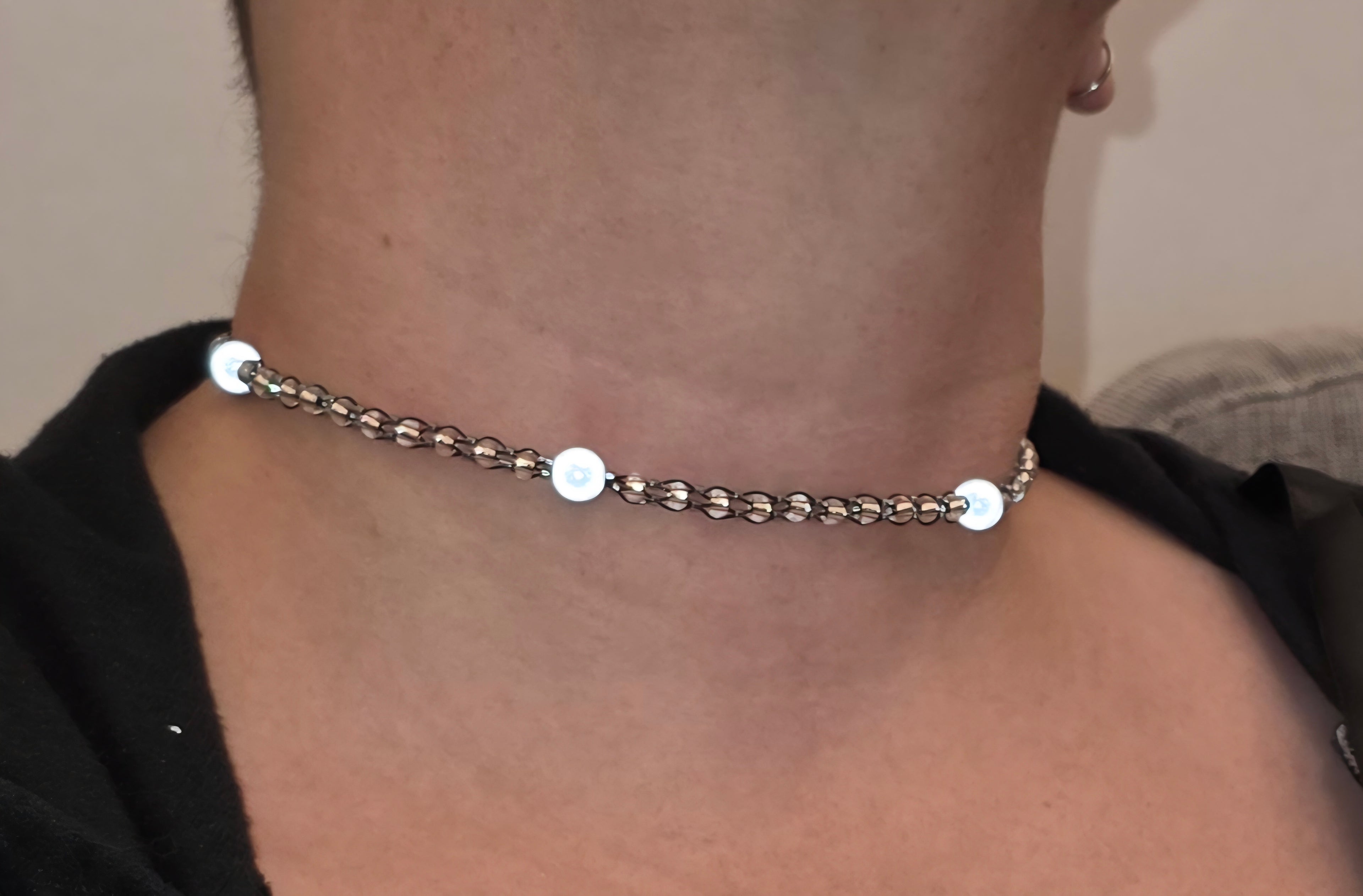 Reflective set of earrings and necklace